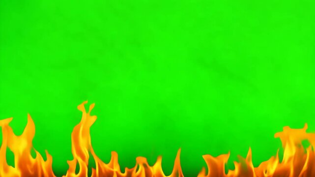 Red bright fire flames dance against isolated green screen background. Orange yellow fireflames burning. Hot dynamic heat. Chroma key backdrop. Fiery stripe frame on edge.