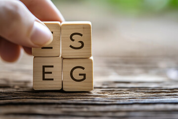 ESG concept of environmental, social and governance. words ESG on a woodblock It is an idea for sustainable organizational development. account the environment, society and corporate governance