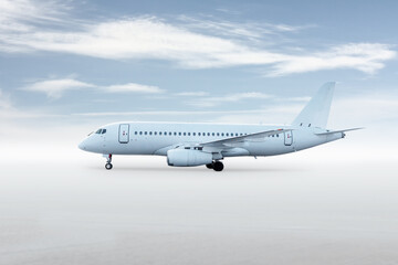 White passenger plane isolated on bright background with sky