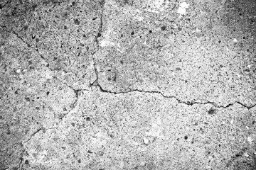 Cracked concrete floor texture background. Dirty old rough and grunge surface.