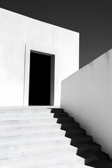Minimalist architecture with white walls and dark color, geometric shape