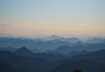 Fototapeta premium Mountain ranges layered with a gradient sky behind