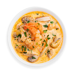 Tom yum soup with shrimps and seafood, top view, on a white background, isolated.