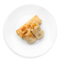 Russian pancakes with apple and cinnamon, top view, on white background, isolated.