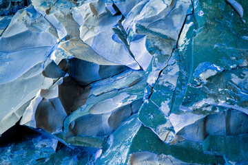 Turquoise and blue, natural stone texture. Sedimentary rock is unique for every natural compound - all kinds of faults, cracks, faults, folds. Different colors and unique pattern.   