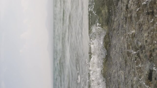 Slow motion closeup shot of clear water waves of a lake