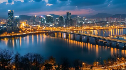 Cityscape at dawn, Busan, South Korea. Urban landscape, bridge, river, lights, modern architecture.