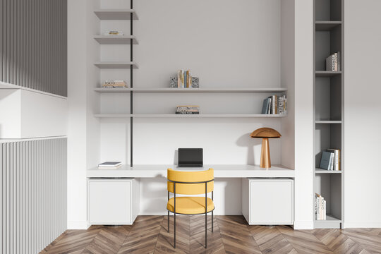 Minimalist workspace with white desk, yellow chair, and wooden floor. 3D Rendering