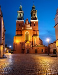 Naklejka premium Generated image A view of the illuminated Cathedral Basilica of St. Peter and St. Paul in Poznan at night