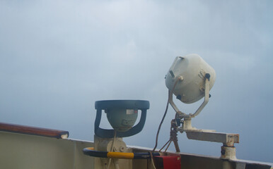 View of the bridge wing equipments of a ship at sea