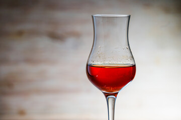Concept photo of liqueur glass without people with text space