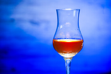 Concept photo of liqueur glass without people with text space