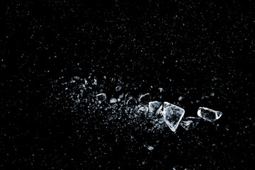 Ice crush on a black background. Chill backdrop.