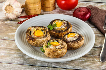 Baked champignon with quail egg