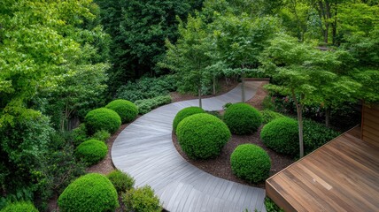 Obraz premium Tranquil garden retreat featuring a harmonious blend of hardscape and lush greenery for relaxation and serenity.