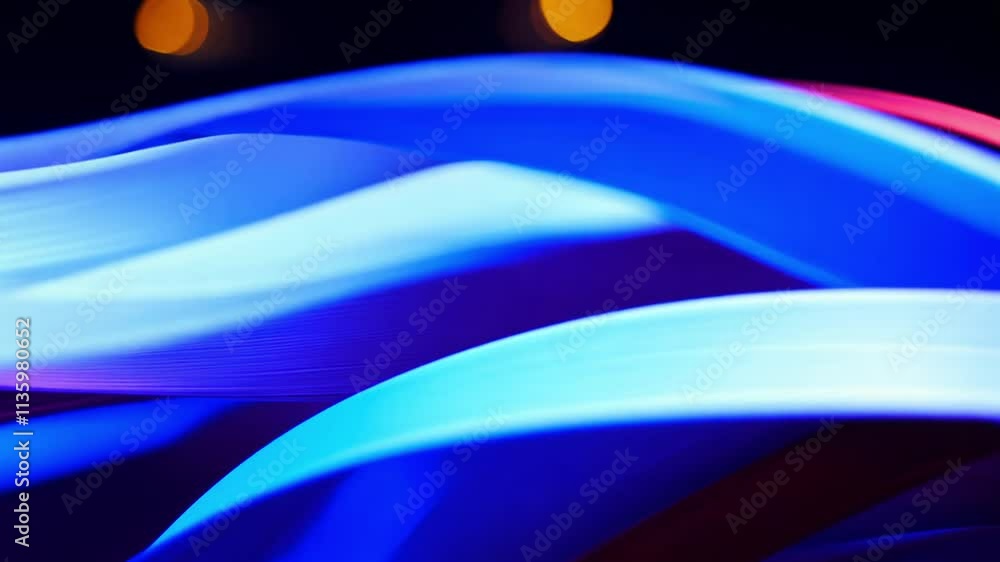 Poster Slow motion video captures flowing ribbon texture in bright blues and reds with smooth undulating patterns