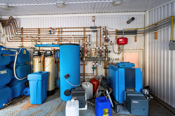 interior apartment room boiler room. heating system, pipes and appliances