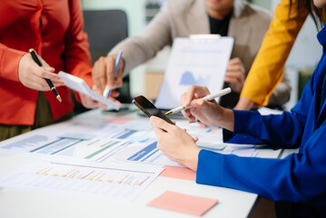 Business people meeting at office writing notes about sticky notes Laptop,tablet  Planning and Brainstorming Strategies