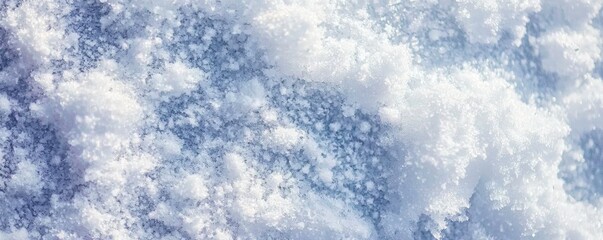 Obraz premium A serene, fluffy cloudscape with soft white clouds against a bright blue sky, creating a tranquil atmosphere.