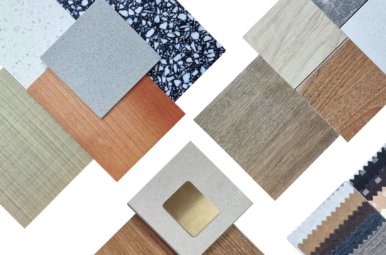 palette of interior material samples in top view contains wooden tiles, artificial stone, terrazzo, gold stainless, drapery, laminated isolated on background with clipping path. selected materials.