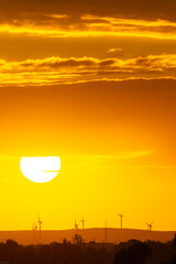 sunset behind the wind turbines in the Essaouira region in Morocco