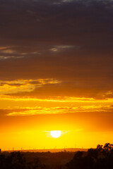 sunset behind the wind turbines in the Essaouira region in Morocco