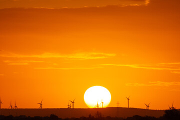 sunset behind the wind turbines in the Essaouira region in Morocco