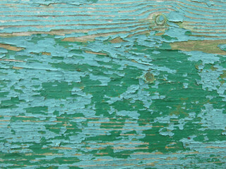 wood painted with peeling green paint