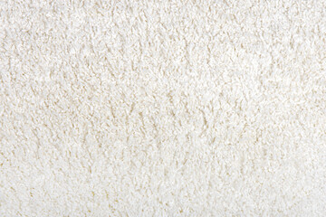 Texture of soft white pile carpet. Close-up. Textures.