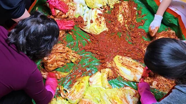 Making "Kimchi," a traditional Korean dish made with green vegetable cabbage. Side dishes for winter. Making kimchi