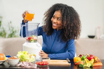Fit woman enjoys healthy fruit breakfast after yoga training. fitness, nutrition, home lifestyle.