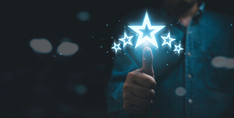 Businessman thumb up with glowing five stars for customer excellent satisfaction and product...