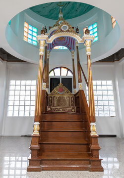 Bangkok, Thailand - Dec 07, 2024 - Ornately decorated minbar pulpit from where prayers are led standing on a platform at Safirusslam Mosque. Islamic Affairs, use it as your Wallpaper, Poster and Space