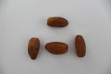 Obraz premium Dried date palm fruits or kurma, ramadhan food