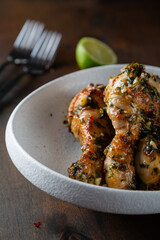 Chicken legs fried with garlic and parsley