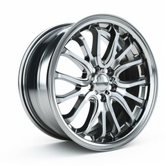 Obraz premium Chrome alloy wheel rim rotating on white background, perfect for automotive and car related designs
