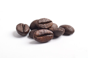 Fototapeta premium Stack of coffee beans isolated on white background