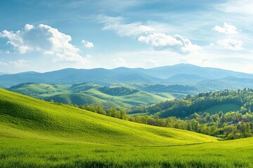 Fototapeta premium panorama of beautiful countryside of romania. sunny afternoon. wonderful springtime landscape in mountains. grassy field and rolling hills. rural scenery
