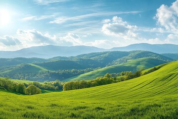panorama of beautiful countryside of romania. sunny afternoon. wonderful springtime landscape in mountains. grassy field and rolling hills. rural scenery