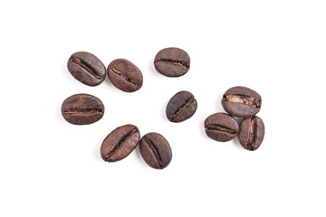 Many roasted coffee beans isolated on white background, top view