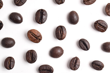 Coffee beans pattern isolated on white background. Top view