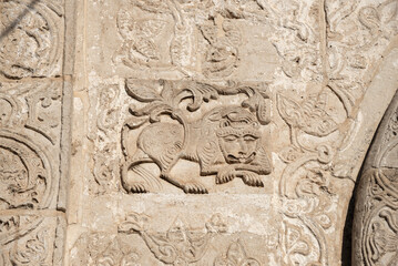 The image of a lion on the wall of the ancient St. George's Cathedral. Yuryev-Polsky, Vladimir region. Russia