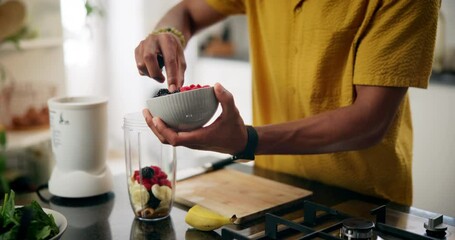 Man, hands or fruit with blender for smoothie, healthy diet or meal prep for nutrition in kitchen at home. Closeup, male person or nutritionist with ingredients for drink, breakfast beverage or detox
