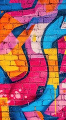Fototapeta premium Colorful wall with a graffiti lettering of the letter J