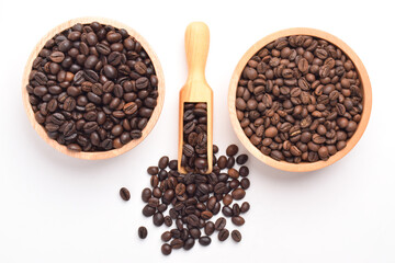 Roasted Coffee beans in wooden bowl isolated on white background