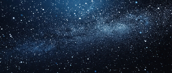Obraz premium A starry night sky with a blue background