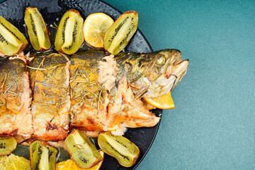 Baked rainbow trout.