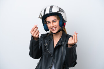 Young caucasian woman with a motorcycle helmet isolated on white background making money gesture