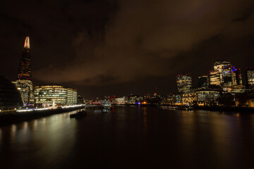 The Shard London, famous iconic modern skyscraper, jutting out from the cityscape skyline at night