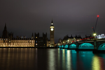 Fototapeta premium Big Ben and Westminster Bridge, London, illuminated at night